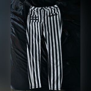 Hi rise super skinny black and white striped jeans from Hot Topic.